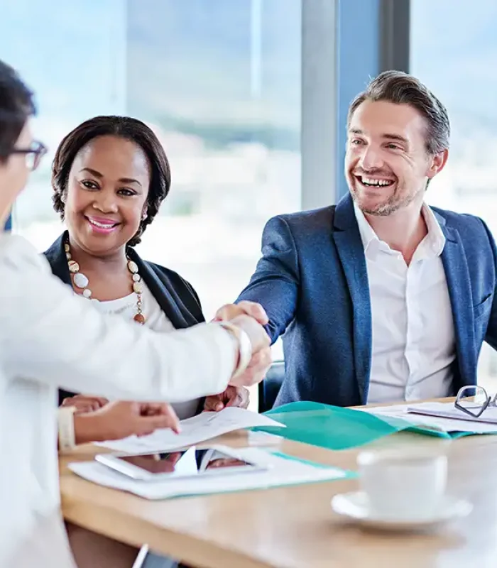 a group of people shaking hands